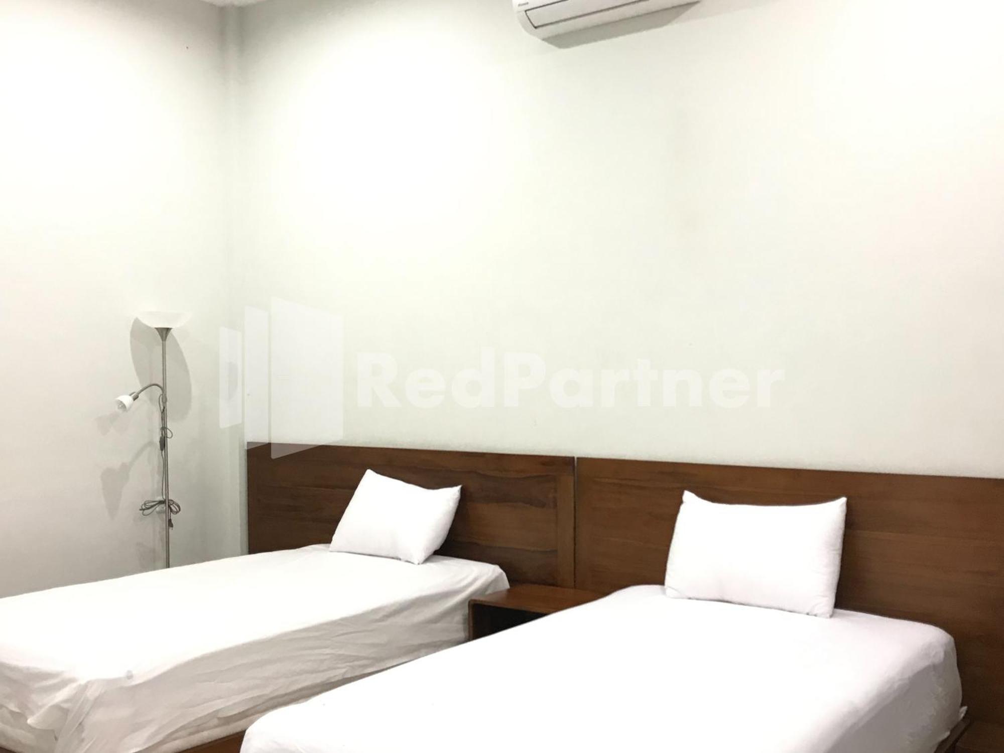 Hotel D88 Mitra Reddoorz Near Santera Flower Garden