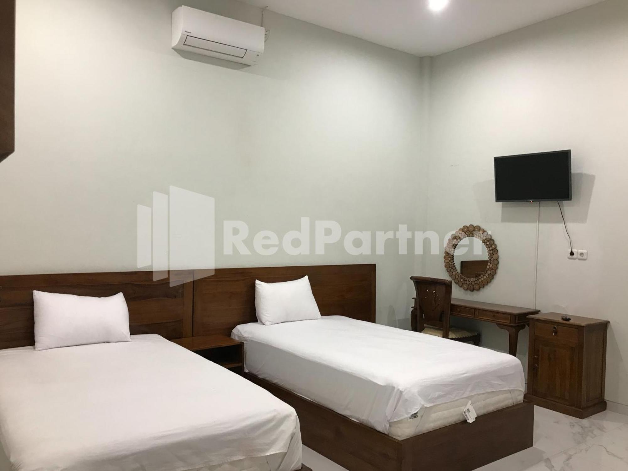 Hotel D88 Mitra Reddoorz Near Santera Flower Garden