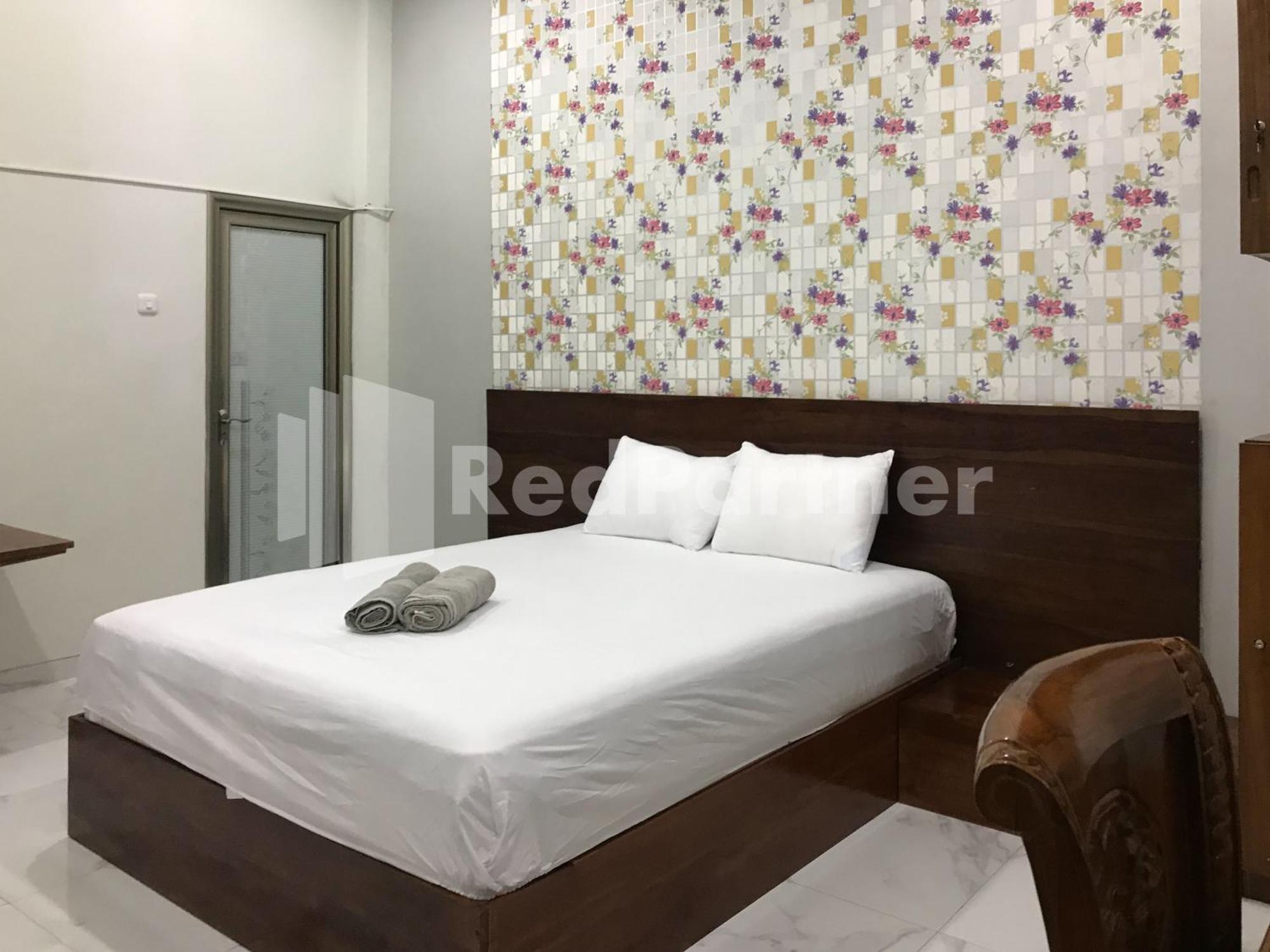 D88 Mitra Reddoorz Near Santera Flower Garden 2*